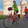 Radfahrer vor dem schiefen Turm in Pisa