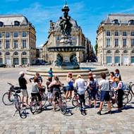 Cyklister vid Place de la Bourse